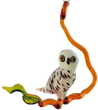 Hängevogel, Schneeeule auf Ast